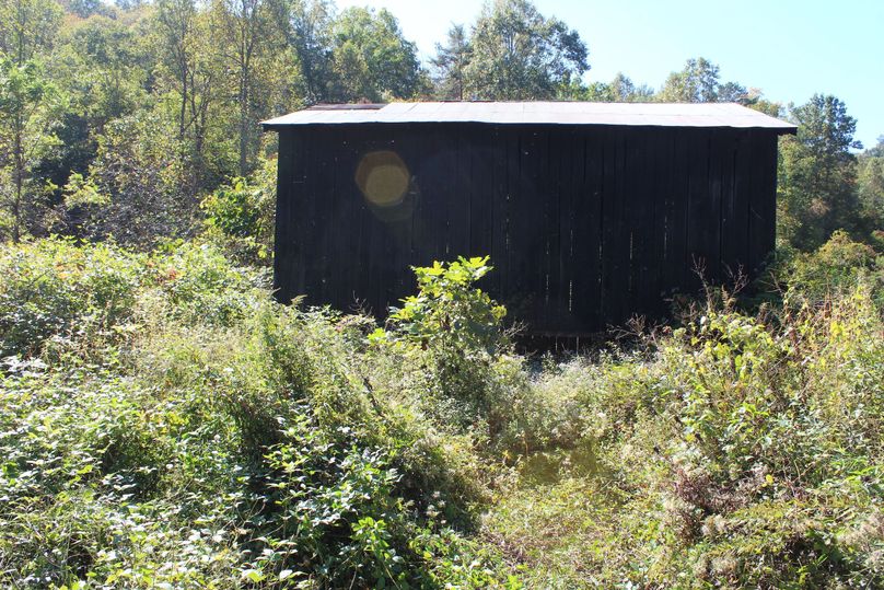 008 the large barn sitting near the south boundary