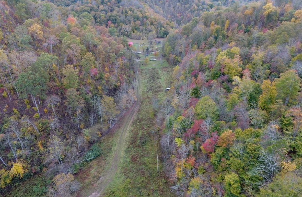 002 drone shot facing south from center of property