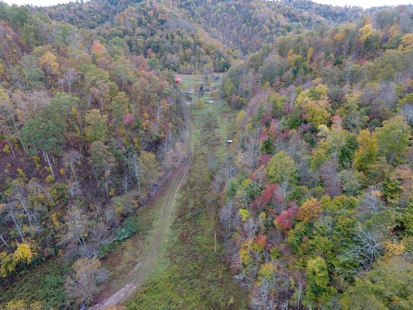 002 drone shot facing south from center of property