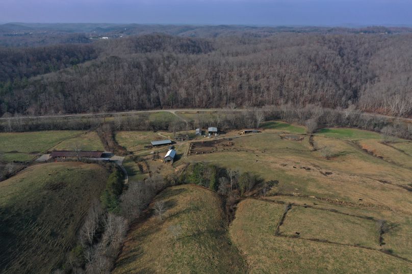 023 view from the middle west area of the property looking west toward the barns and structures