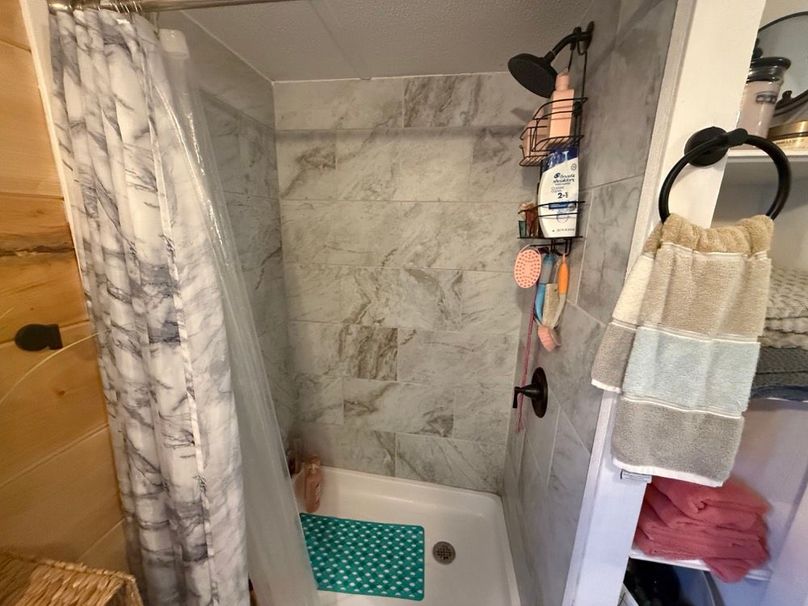 030 the tile shower in the master bathroom