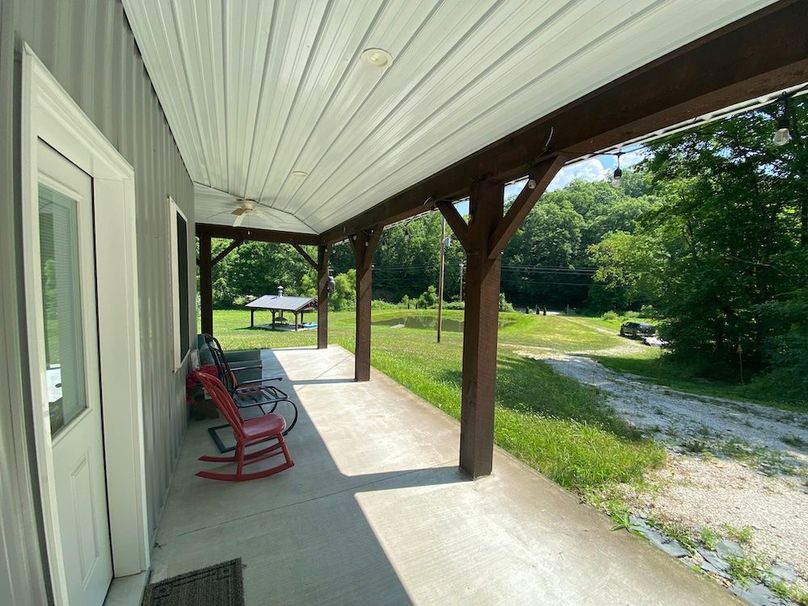 042 gorgeous front porch area looking down the driveway copy