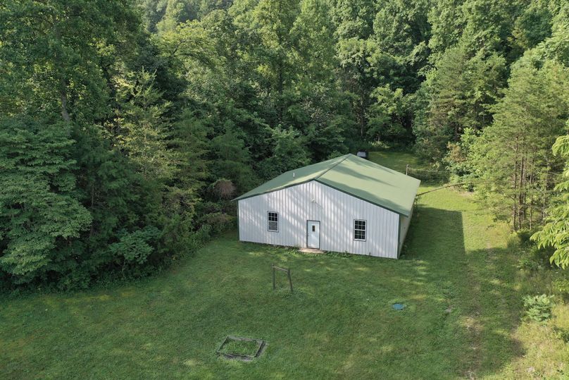 023 low altitude aerial drone shot of the 40x40 pole barn style building with its own water, electric and septic